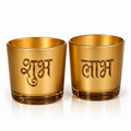 Shubh Labh glass tealight holders, pair by Amore Candles